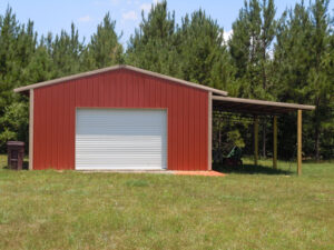 A red metal garage with a garage door.